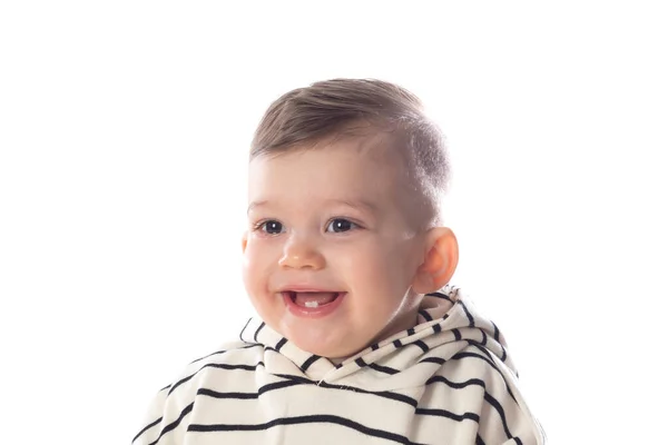 Beyaz Duvar Arkasında Gülümseyen Şık Giyinen Küçük Bir Çocuk — Stok fotoğraf