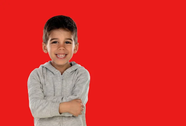 Happy Child His Arms Crossed Isolated Red Background — Stock Photo, Image