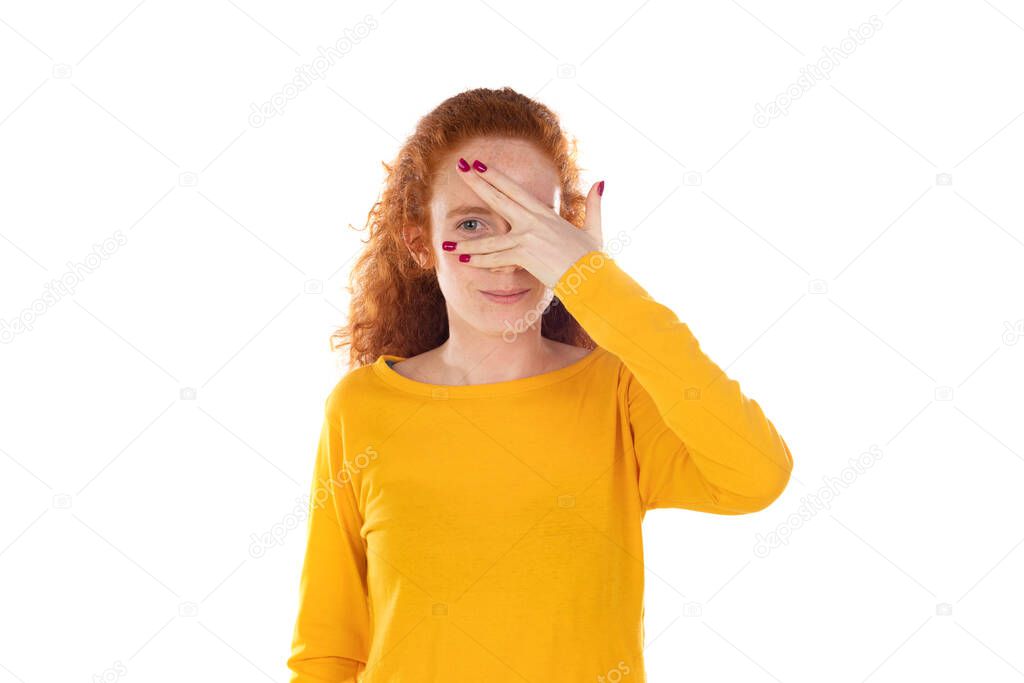 Redhead wman fooling around, making glasses hands isolated on a white background