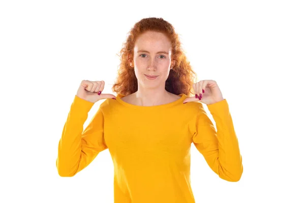 Redhaired Girl Yellow Shirt Pointing Something Isolated White Background — Zdjęcie stockowe