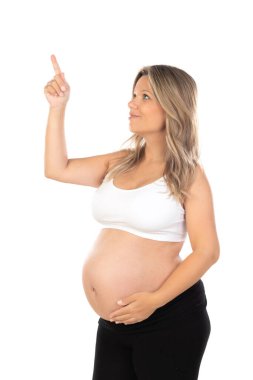 Young beautiful blonde woman pregnant expecting baby over isolated white background with a happy and cool smile on face. Lucky person. 