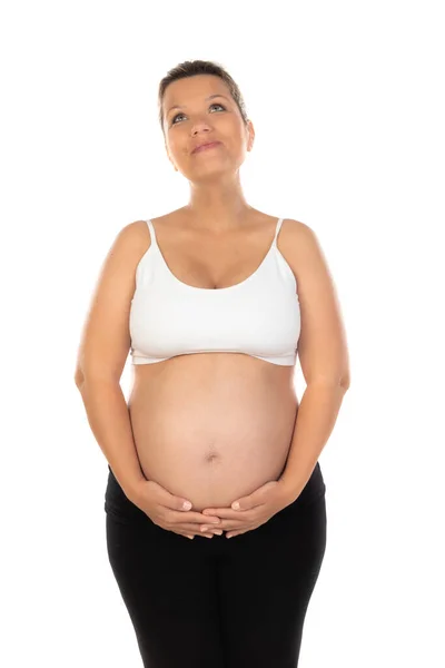 孕妇双手被隔离在白色背景下触摸腹部的图像 — 图库照片