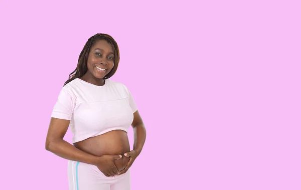 Young Beautiful Pregnant African Woman Color Background — Stockfoto