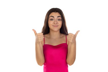 Beyaz arka planda izole edilmiş, OK Jest yapan genç bir kızın portresi. Güzel esmer genç kız gülümsüyor ve tamam işareti veriyor. Mutlu şirin çocuk görünüyor.. 