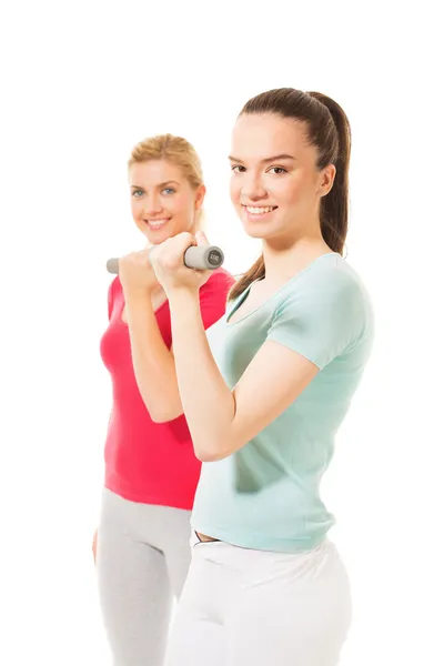 Mulheres fitness trabalhando com halteres — Fotografia de Stock