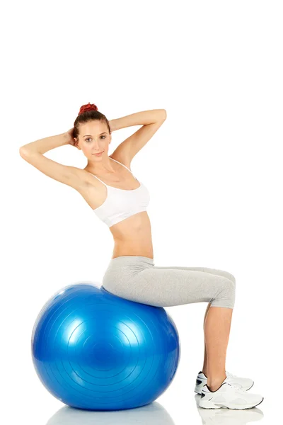 Fitness girl working on pilates ball — Stok fotoğraf