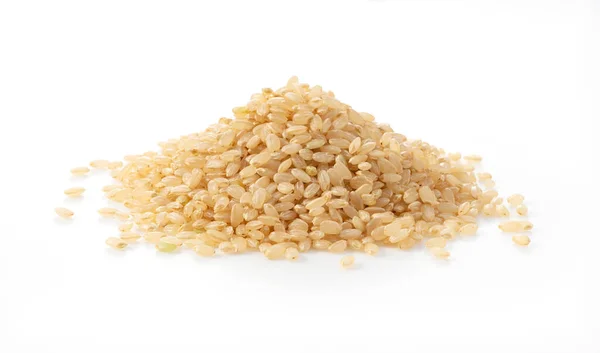 Hnědá Rýže Umístěná Bílém Podkladu Hromada Hnědé Rýže — Stock fotografie