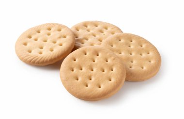 Beyaz arka plana yerleştirilmiş bir sürü kurabiye. 