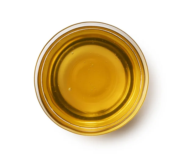 蜂蜜在一个白色背景的玻璃瓶里 从上面看 — 图库照片
