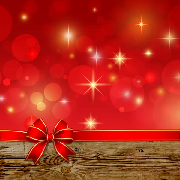 Lazo de cinta roja con bokeh, decoración de Navidad — Vector de stock