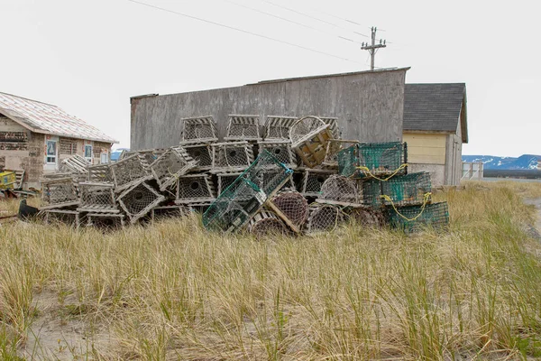 empty lobster and crab traps along the road in newfoundland