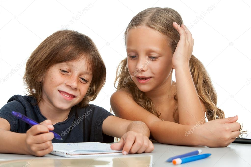 Children doing homework together.