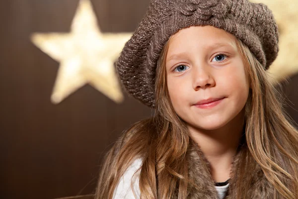 Portrait of cute girl wearing slouchy beanie. — Stock Photo, Image