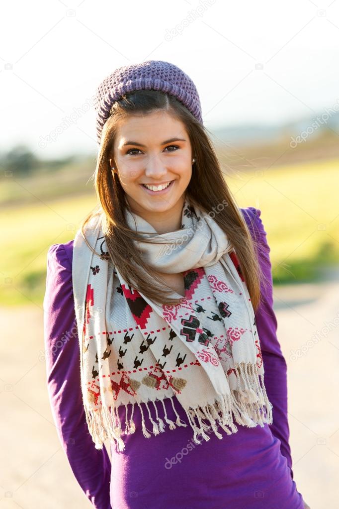 Portrait of cute teen girl with scarf and beanie.