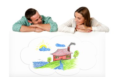 Young couple daydreaming of future house. clipart