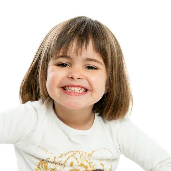 Doce menina mostrando dentes . — Fotografia de Stock