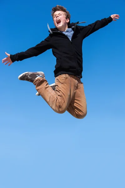 Jumping boy shouting. — Stock Photo, Image