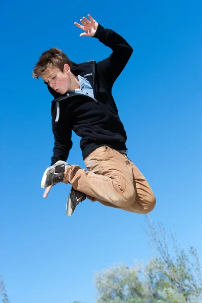 Energetic boy jumping. — Stock Photo, Image