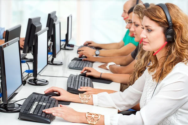 Young business people working on computers. — Stock Photo, Image