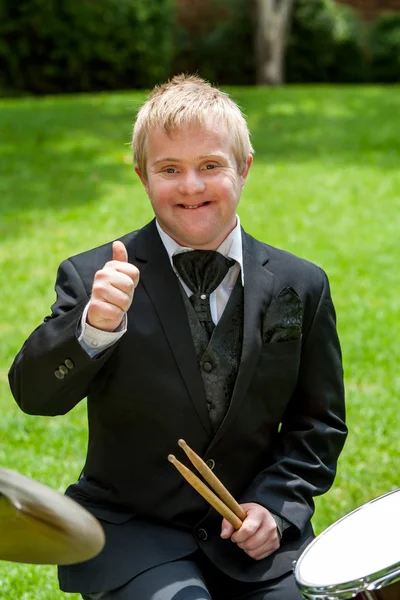 Handicapped drummer showing thumbs up. — Stock Photo, Image