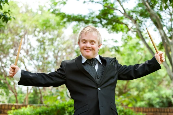 Happy handicapped musician. — Stock Photo, Image