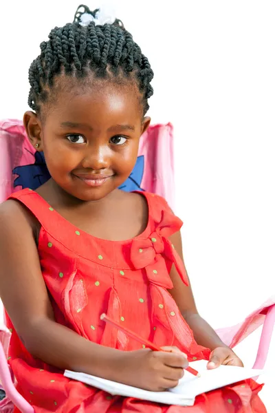 Cute little african girl drawing. — Stock Photo, Image