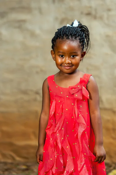 Cute african youngster in red dress. — Stock Photo, Image