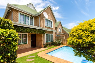 House with swimming pool. clipart