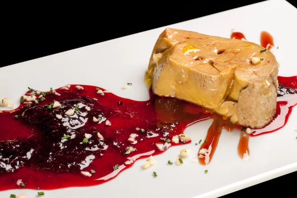 Foie gras with red fruit sauce. — Stock Photo, Image