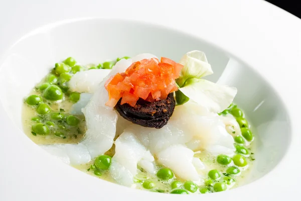 Cod fish with peas. — Stock Photo, Image