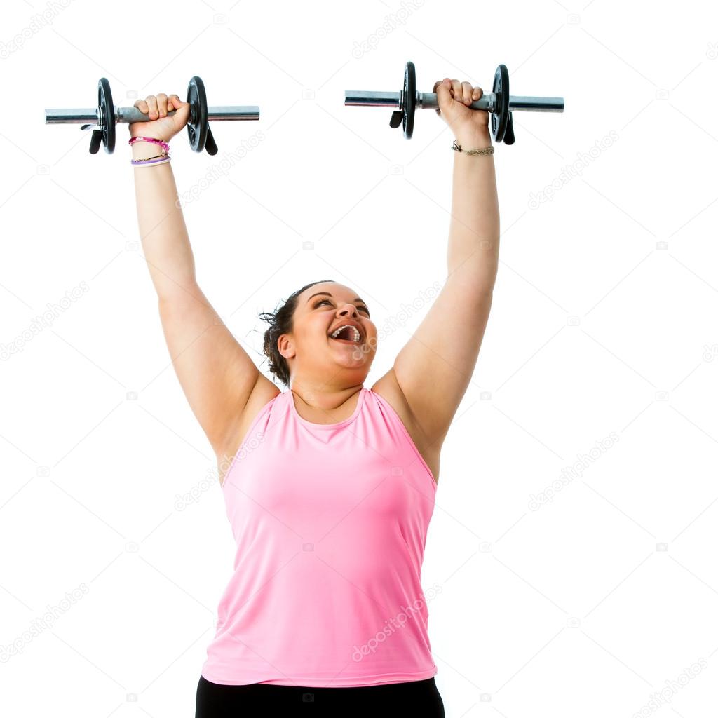 Corpulent lady doing weight workout.