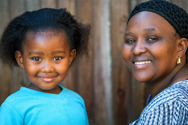 Little african girl and mother. — Stock Photo, Image