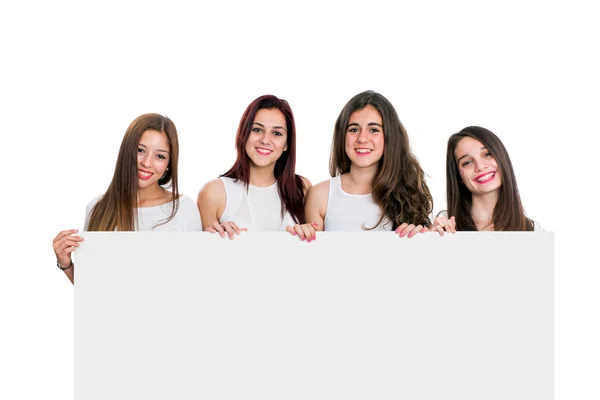 Gruppe von Freundinnen mit weißem Brett — Stockfoto