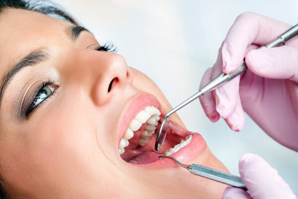 Girl having dental check up