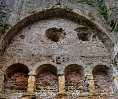 Remains of Chepstow Castle (Castell Cas-gwent) at Chepstow, Monmouthshire, Wales, United Kingdom on 04 June 2022