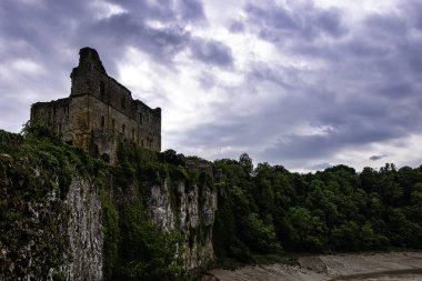 Remains of Chepstow Castle (Castell Cas-gwent) at Chepstow, Monmouthshire, Wales, United Kingdom on 04 June 2022