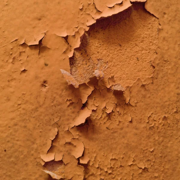 Old cracked orange paint — Stock Photo, Image