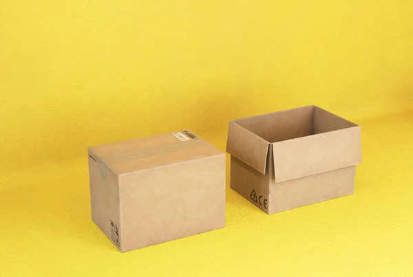 Empty Open Cardboard Boxes Yellow Background — Stock Photo, Image