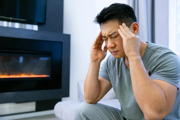 Tired Asian Man Sitting Sofa Has Headache Unhealthy Guy Has — 图库照片