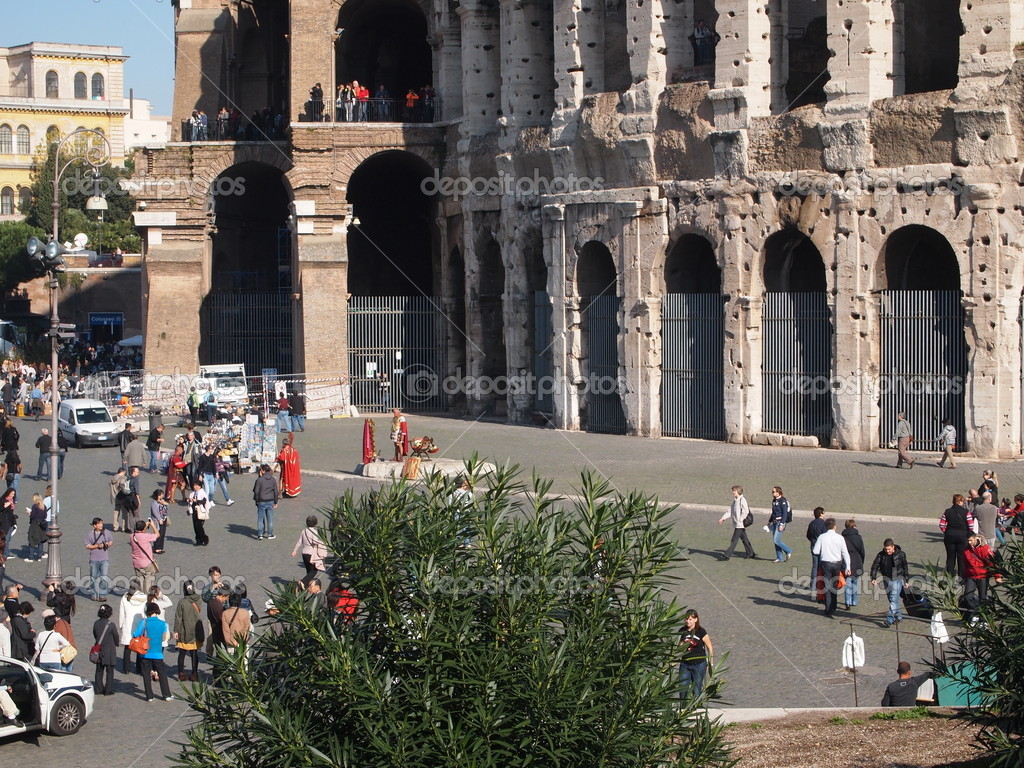 Rome, tourists at the colosseum — Stock Photo © orsinico62 12664949