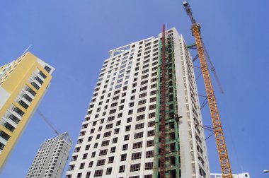 High rise buildings under construction clipart
