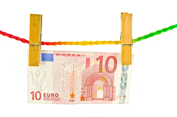 Euro dinero colgando con pin de ropa de madera — Foto de Stock