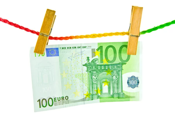 Euro-penger hengende med treklesplugg – stockfoto