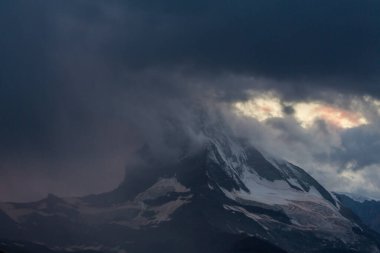 Beautiful scenery in the Swiss Alps in summer, with Matterhorn peak in the background