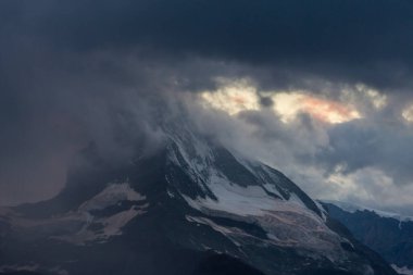 Beautiful scenery in the Swiss Alps in summer, with Matterhorn peak in the background