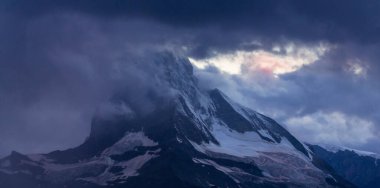 Beautiful scenery in the Swiss Alps in summer, with Matterhorn peak in the background