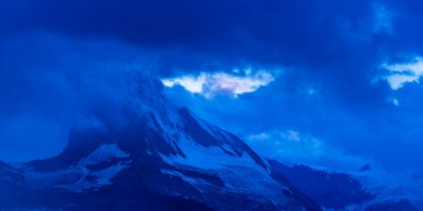 Beautiful scenery in the Swiss Alps in summer, with Matterhorn peak in the background