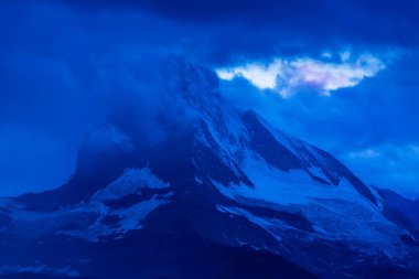 Beautiful scenery in the Swiss Alps in summer, with Matterhorn peak in the background