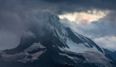 Beautiful scenery in the Swiss Alps in summer, with Matterhorn peak in the background