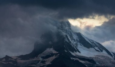 Beautiful scenery in the Swiss Alps in summer, with Matterhorn peak in the background